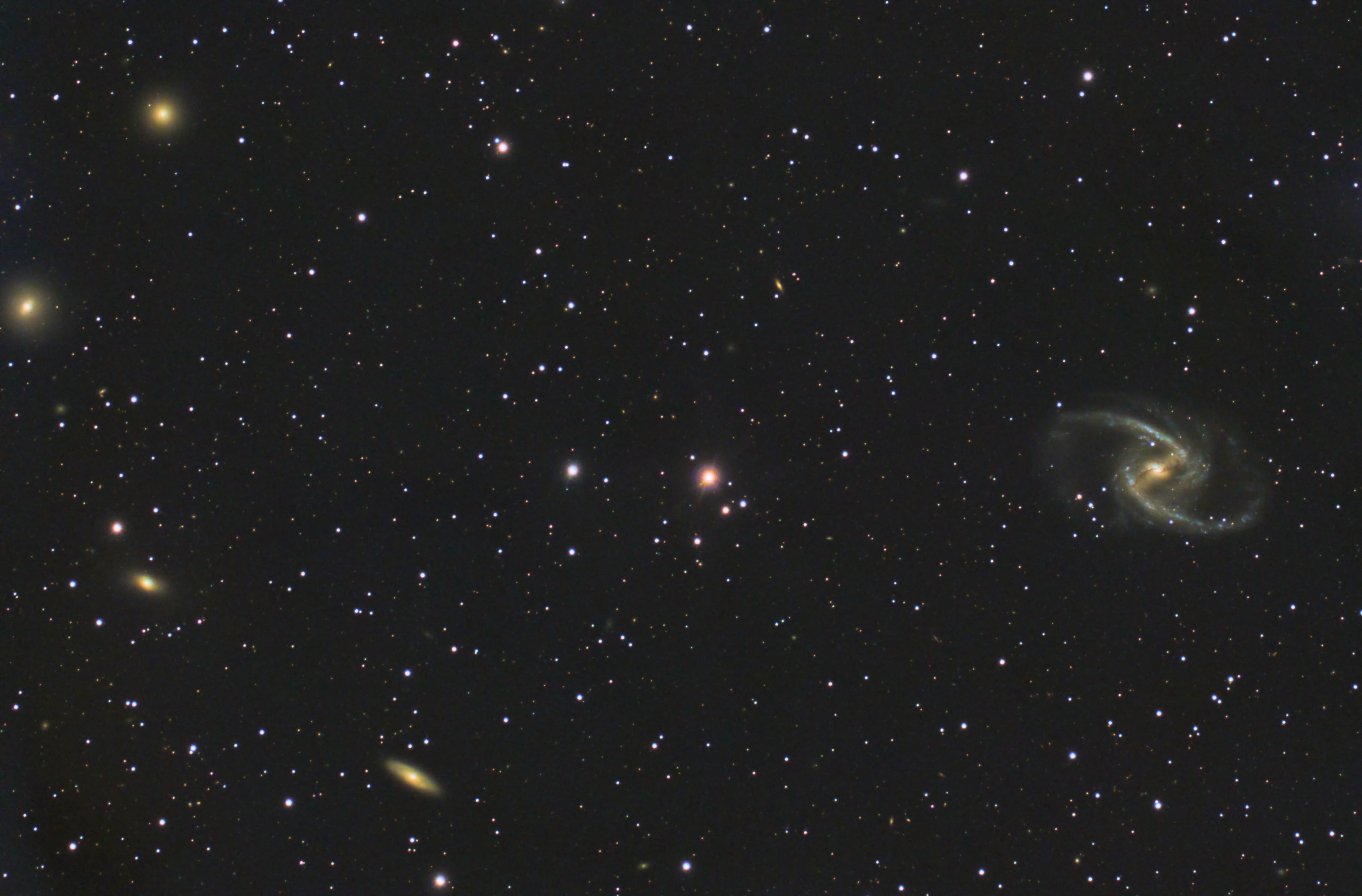 An astrophotographer working beneath the Milky Way